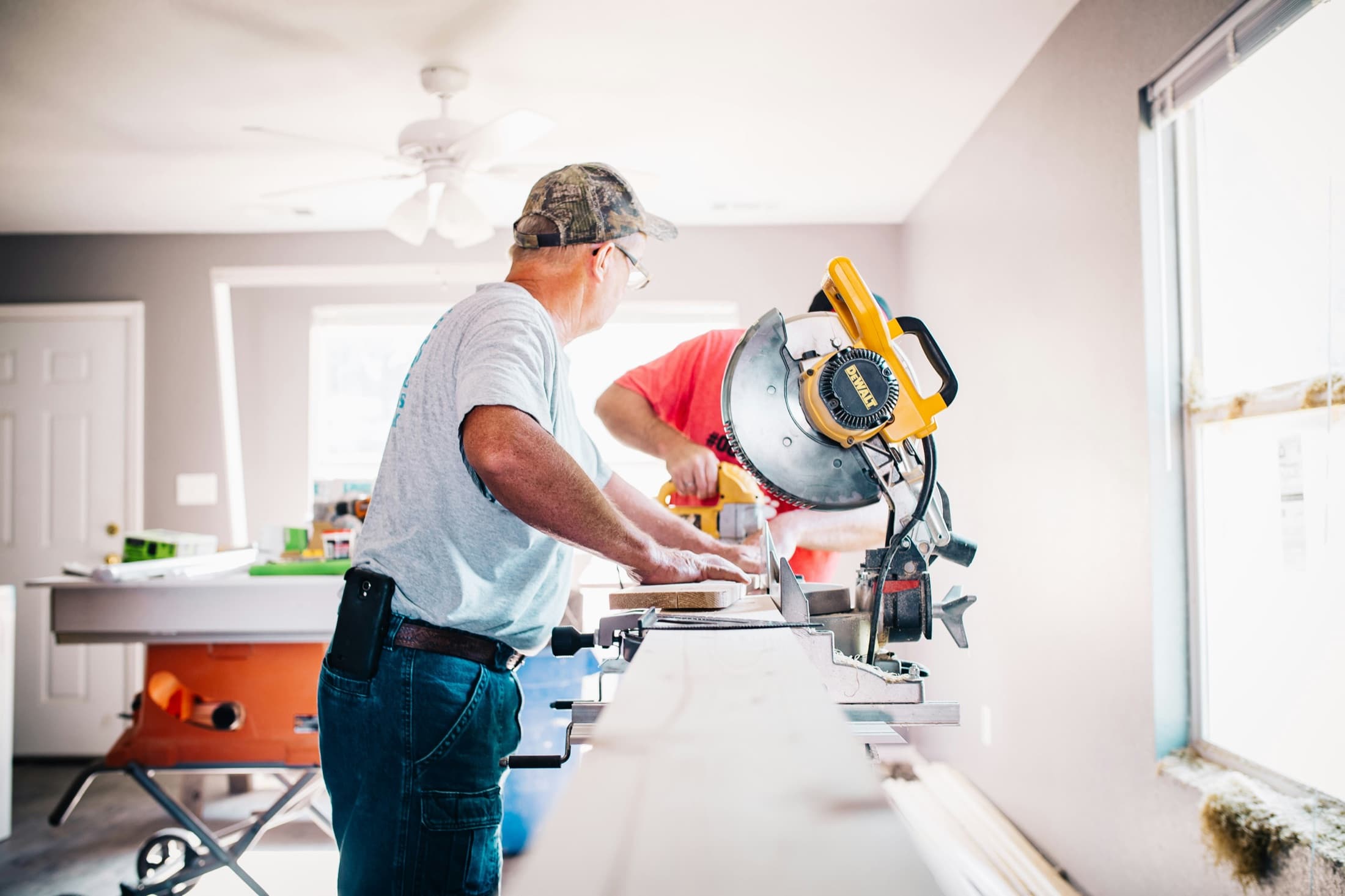 Contractors working on a remodel for contractor tax reserve planning