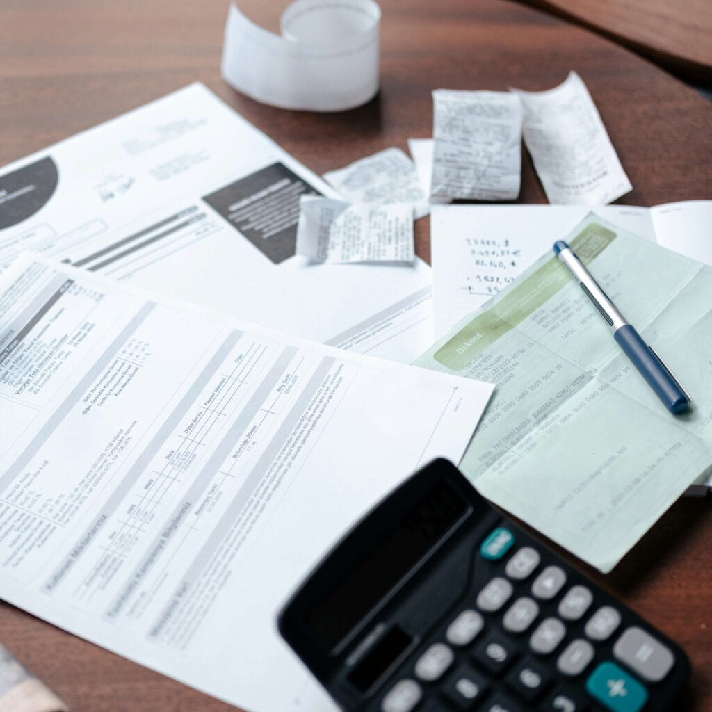 Business owner reviewing tax documents at desk